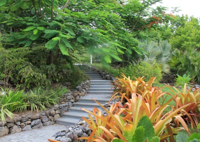 Granite steps leading down to the villa entrance