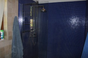 Large glass tiled shower